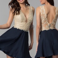 a woman in a navy blue dress with a lace top
