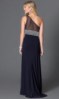 the back of a woman in a navy evening gown with beading