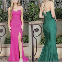 a woman in a green and pink dress with a slit