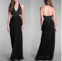 the back view of a woman in a black halter dress