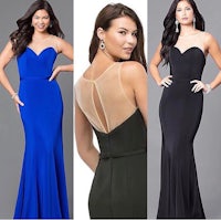 a woman in a black and blue evening gown