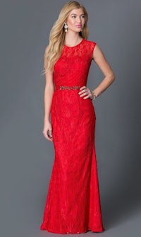 a woman in a red lace dress is posing for a photo