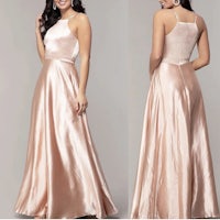 a woman wearing a blush satin prom dress