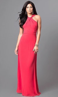 a woman is posing in a red gown