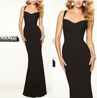 a woman in a black evening gown