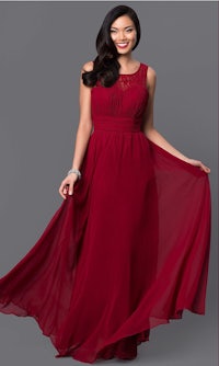 a woman wearing a burgundy bridesmaid dress