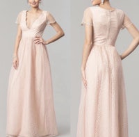a pink bridesmaid dress with a v - neck and beading