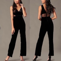 a woman in a black velvet jumpsuit