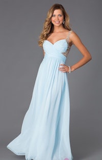 a woman wearing a light blue prom dress