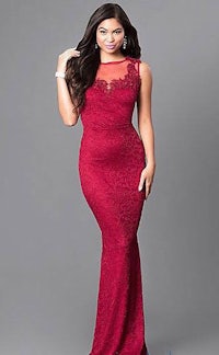 a woman is posing in a burgundy lace dress