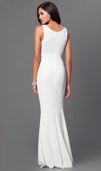 the back view of a woman in a white gown