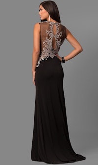 the back of a woman in a black evening gown with beading