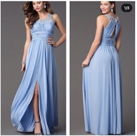 a woman in a light blue dress with a slit