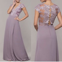 the bridesmaid dress has a v - neck and lace overlay