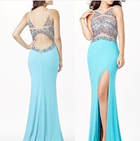 a woman in a blue dress with a slit