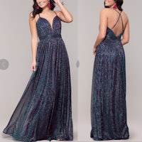 the back view of a woman in a blue and purple dress