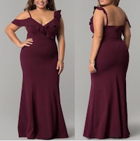 a plus size woman wearing a burgundy dress with ruffles