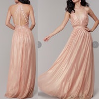 the back view of a woman in a blush gown