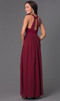 the back view of a woman in a burgundy bridesmaid dress