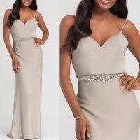the bridesmaid is wearing a grey gown with a beaded belt