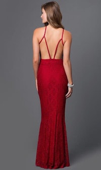 the back of a woman in a red lace dress