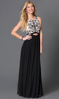 a woman wearing a black and beige maxi dress