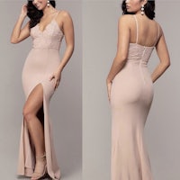 the back view of a woman in a nude dress with a slit