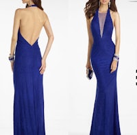 a woman in a blue gown with a halter back