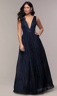a woman in a navy long dress